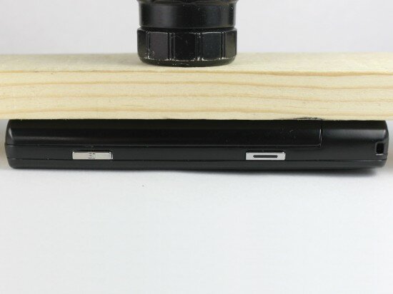 Pic. 5. The phone under the 3 kg (6.6 lbs) wooden bar