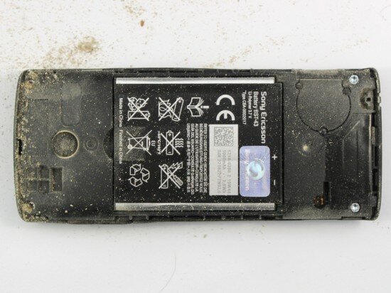 Pic. 10. Dust under the battery cover