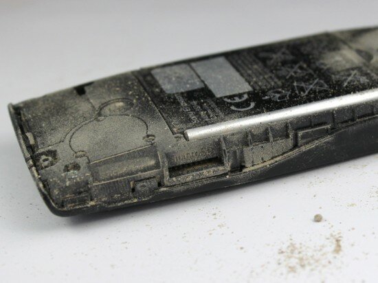 Pic. 17. Dust in the battery slot