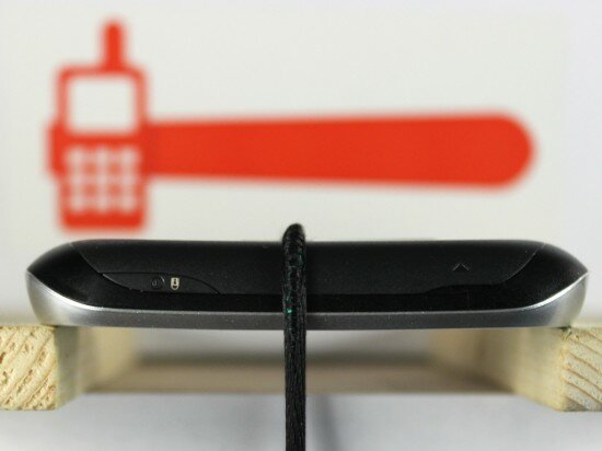 Pic. 12. Breaking the phone in half by applying the 15 kg (33 lbs) load on top of it (the phone was placed face down)