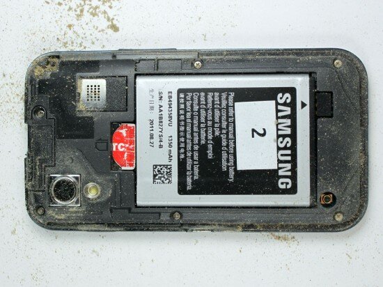 Pic. 18. Dust and sand in the battery compartment